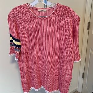 Celine top. Size S, but this top is Apx. 23 inches long and 18 inches wide.